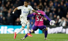 Leeds’ Crysencio Summerville (left) and Trai Hume of Sunderland battle for the ball during the  Championship match at Elland Road
