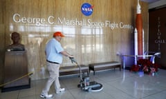 A worker cleans the floors at Nasa’s Marshall Space Flight Center, which was affected by the partial federal government shutdown.