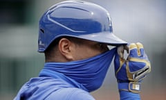 The Kansas City Royals’ Salvador Perez adjusts his mask during batting practice. He tested positive for Covid-19 earlier this summer