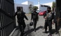 Police at the entrance of La Prensa office in Managua on Friday.