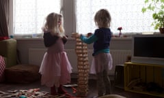 Children building toy blocks