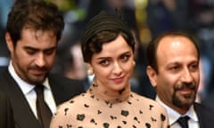 Taraneh Alidoosti with co-star Shahab Hosseini and director Asghar Farhadi on the red carpet in Cannes. 