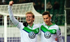 Goalscorer Schürrle celebrates with Julian Draxler.