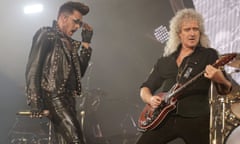 Brian May (right) of Queen and Adam Lambert performing live in January 2015