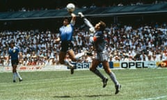 Diego Maradona beats Peter Shilton to the ball with his hand to score his infamous goal.