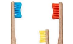 Blue, red and smaller yellow toothbrush