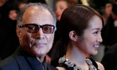 Director Kiarostami and cast member Rin Takanashi arrive on the red carpet for the screaning of the film Like Someone in Love at the 65th Cannes Film Festival<br>Director Abbas Kiarostami (L) and cast member Rin Takanashi arrive on the red carpet for the screaning of the film "Like Someone in Love", in competition at the 65th Cannes Film Festival, May 21, 2012.       REUTERS/Yves Herman (FRANCE  - Tags: ENTERTAINMENT)