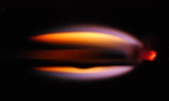 A high-res, still camera image of an experimental fire in low gravity conditions.