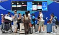 Passengers orienting themselves at Gatwick airport yesterday