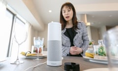 A woman interacts with Amazon Echo Plus.