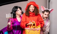 Debbie Chazen, as Mother Hoodman, Gemma Barnett, as Little Red Riding Hood, and Josh Glanc as the Pig in the panto.