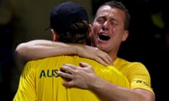 Alex de Minaur hugs Australia captain Lleyton Hewitt after beating Emil Ruusuvuori