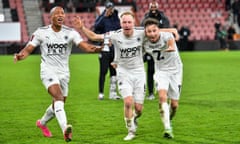 Adrian Clifton (let), Scott Boden (centre) and Kane Smith celebrate Boreham Wood’s memorable FA Cup win at Bournemouth. 