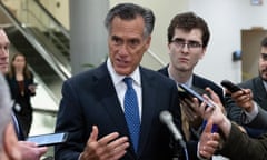 man surrounded by reporters