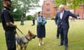 Boris Johnson and home secretary Priti Patel during a visit to Surrey police headquarters in Guildford as part of his ‘crime week’.