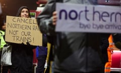 Northern rail passengers protest at Manchester Victoria station about delays and poor service.