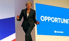 Theresa May arrives on stage dancing to Abba's Dancing Queen before delivering her keynote address on the final day of the 2018 Conservative party conference in Birmingham.