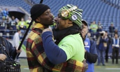 Chad Johnson (left) greets Seattle running back
Marshawn Lynch before a game in December