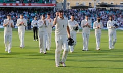 Alastair Cook is applauded off by the rest of the England players at the end of play on the fourth day at the Oval