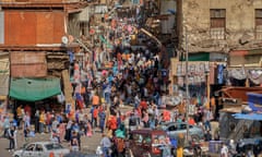 An outdoor market largely frequented by working-class families and informal street vendors in downtown Cairo