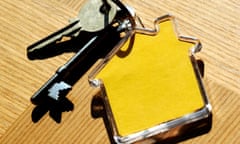 House keys and house shaped keyring
