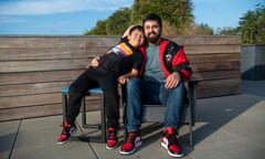 Tommy Andrade with his son Thaddeus, eight, outside their home in Seattle.