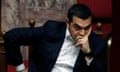 Worried-looking Tsipras with wrinkled forehead in chair