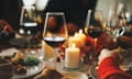 Red wine glasses at a festive dinner table