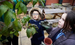 Pupils at Bidston Village primary in Birkenhead in the school’s edible playground.