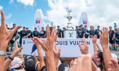 TOPSHOT - Emirates Team New Zealand on stage moments before being presented with the America’s Cup America’s Cup in the Great Sound during the 35th America’s Cup June 26, 2017 in Hamilton, Bermuda. / AFP PHOTO / Chris CAMERONCHRIS CAMERON/AFP/Getty Images