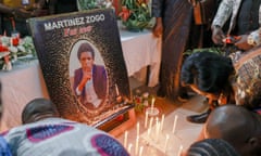 Mourners lay tributes during a ceremony for murdered journalist Martinez Zogo in Yaoundé in January.
