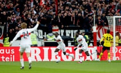 Silas Katompa Mvumpa wheels away after scoring for Stuttgart and making it 3-3 against Dortmund.