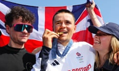 Team GB’s Tom Pidcock celebrates with his gold medal