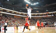 Terrence Williams of the New Jersey Nets dunks against the Houston Rockets during a 2010 game in China.