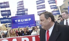 Chris Christie in front of Trump signs