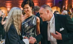 US singer Patti Smith (L) talks to Swedish conservative leader Anna Kinberg Batra (C) and Swedish left party leader Jonas Sjostedt (R) at the 2016 Nobel prize award banquet at the Stockholm City Hall on December 10, 2016. 

Patti Smith performed one of Literature prizewinner Bob Dylan's songs at the award ceremony earlier on Saturday. / AFP PHOTO / TT NEWS AGENCY / JESSICA GOW / Sweden OUTJESSICA GOW/AFP/Getty Images
