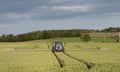 Tractor spraying a wheat crop