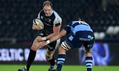 Ospreys’ Alun Wyn Jones with George Earle of Cardiff Blues in January.