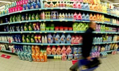 SHOPPER PASSES DISPLAY OF DETERGENTS IN BRUSSELS DEPARTMENT STORE<br>A shopper walks past a display of detergents in a department store in Brussels October 29, 2003. European Union industry will face the biggest new environmental crackdown in years when the European Commission unveils a bill on Wednesday to control the toxic threat posed by thousands of manufactured chemicals, including those used in everyday products. REUTERS/Yves Herman