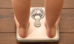 Childhood obesity<br>Embargoed to 0001 Tuesday October 11 Picture posed by model File photo dated 03/03/14 of an 11 year old girl using a set of weighing scales as more than 1.6 million children who started secondary school in the past decade were overweight or obese, new calculations show. PRESS ASSOCIATION Photo. Issue date: Tuesday October 11, 2016. Between 2006/07 and 2014/15, there were 1,654,894 children in England who started Year 7 with an unhealthy weight, according to Cancer Research UK. See PA story HEALTH Obesity. Photo credit should read: Chris Radburn/PA Wire