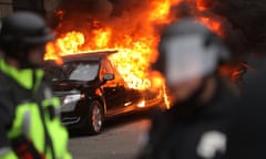 Police and demonstrators clash in downtown Washington after a limo was set on fire following the inauguration of Donald Trump.