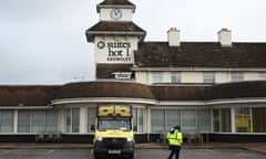 A police van outside a hotel in Knowsley near Liverpool