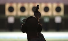 Emil Milev from the United States practices for the men's 25m rapid fire pistol shooting competition at Olympic Shooting Center ahead of the 2016 Summer Olympics in Rio de Janeiro, Brazil Thursday, Aug. 4, 2016. (AP Photo/Eugene Hoshiko)