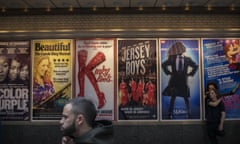 Tourists In Times Square Ahead Of Theater Ticket Sales Figures<br>Pedestrians walk past signage for the Broadway shows ‘The Color Purple’, ‘Beautiful’, ‘Kinky Boots’, ‘Jersey Boys’, ‘Matilda’ and ‘On Your Feet’, in the Times Square area of New York, U.S., on Sunday, May 22, 2016. Forty theaters sold a record $1.365 billion worth of tickets during the 2014-2015 Broadway Theatre season. The Broadway League is scheduled to announce its end-of-season statistics for the 2015-12016 season the week of May 23. Photographer: Victor J. Blue/Bloomberg via Getty Images