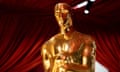 US-ENTERTAINMENT-AWARD-FILM-OSCARS<br>Oscars statues line the red carpet as preparations are made ahead of the 95th Academy Awards, in Hollywood, California, on March 10, 2023. - The red carpet for the Oscars airing on March 12, 2023, is champagne-color for 2023. (Photo by Stefani Reynolds / AFP) (Photo by STEFANI REYNOLDS/AFP via Getty Images)