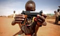 A boy with a gun in Darfur