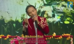 A screen capture of a telecast showing Karan Rai, of Louisville, Kentucky, singing on the Nepali version of the Voice, which he won, the culmination of a remarkable journey that began with his birth in a Nepali refugee camp.