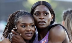 Daryll Neita and Dina Asher-Smith embrace at an event.