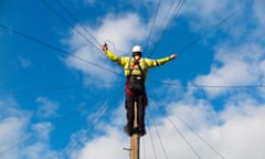 Telecoms engineer working on a London street.