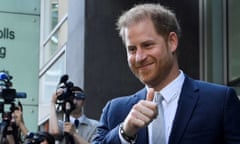 Prince Harry gives a thumbs up to the camera